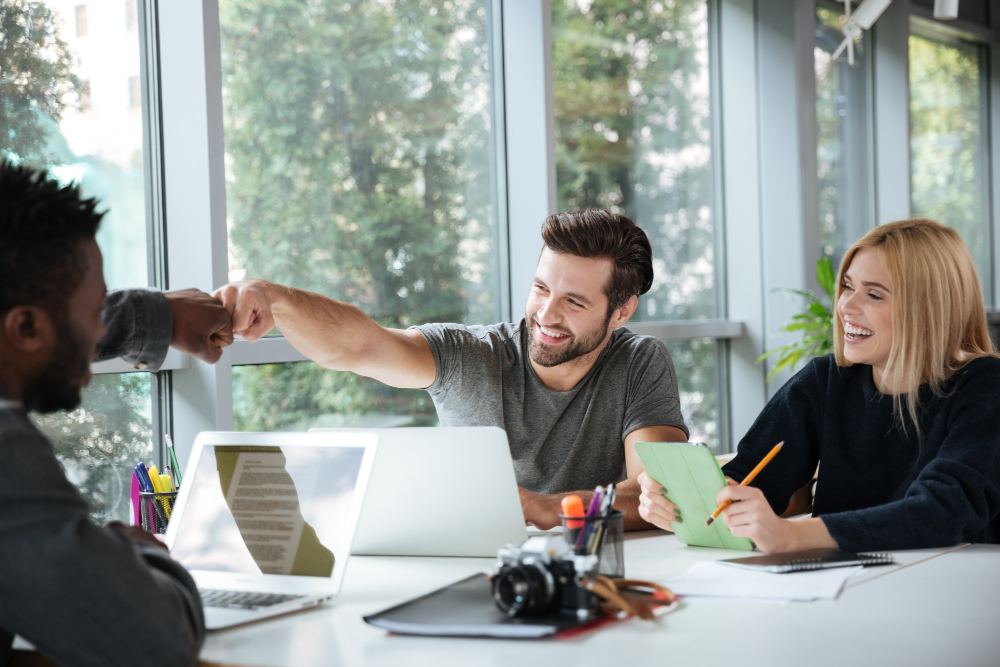 A team in a meeting with a great team spirit.